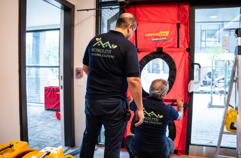 blower door testing in a house